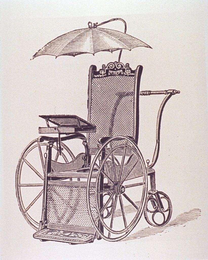 .Wheelchair with writing desk and umbrella.jpg